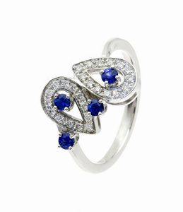 ANELLO - Peso gr 4 1 Misura15 in oro bianco  sommit composta da due gocce in diamanti taglio brillante per totali ct 0  [..]