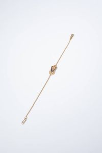 BRACCIALE - Peso gr 3 5 Lunghezza cm 17 5 in oro rosa con nodo al centro in diamanti taglio brillante per totali ct 0 12 ca  [..]