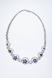 GIROCOLLO - Peso gr 34 in oro bianco  cerchi degrad  in diamanti taglio brillante per complessivi ct  2 0 ca e zaffiri taglio  [..]