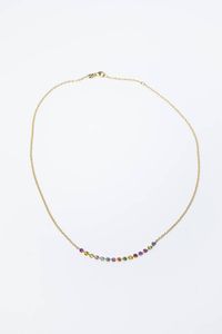 CATENA CON CIONDOLO - Peso gr 4 6 in oro giallo con elemento centrale rigido impreziosito da pietre fini.