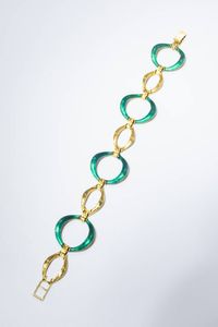 BRACCIALE - Peso gr 29 Lunghezza cm 19 5 in oro giallo composto da con ovali mossi alternati ad ovali in smalto verde.
