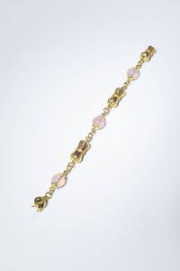 BRACCIALE - Peso gr 38 Lunghezza cm 21 composto da elementi cilindrici satinati alternati a sfere di quarzo rosa del diam  [..]
