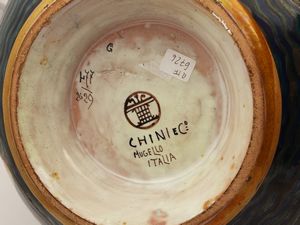 Vaso globulare in terracotta invetriata a lustro, Tito Chini  - Asta 	 Una casa fiorentina. Tra tradizione e modernit Arte moderna e contemporanea Raccolta di dipinti moderni e Design - II  - Associazione Nazionale - Case d'Asta italiane