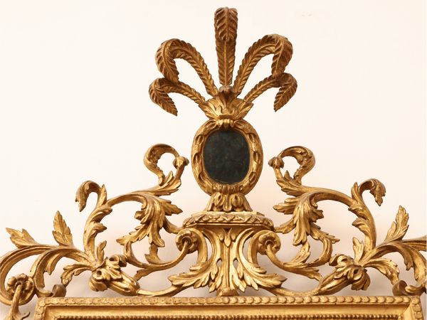 Specchiera con cornice in legno intagliato e dorato facente parte di una coppia  - Asta Una casa fiorentina. Tra tradizione e modernit Le collezioni, i dipinti, gli arredi - III  - Associazione Nazionale - Case d'Asta italiane