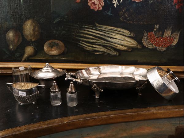 Lotto di accessori per la tavola in metallo argentato  - Asta Una casa fiorentina. Tra tradizione e modernit Le collezioni, i dipinti, gli arredi - III  - Associazione Nazionale - Case d'Asta italiane