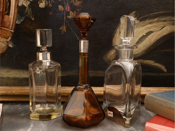 Tre bottiglie da vino in vetro e cristallo  - Asta Una casa fiorentina. Tra tradizione e modernit Le collezioni, i dipinti, gli arredi - III  - Associazione Nazionale - Case d'Asta italiane