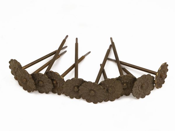 Serie di dieci ambrasse in ottone  - Asta Una casa fiorentina. Tra tradizione e modernit� Le collezioni, i dipinti, gli arredi - III  - Associazione Nazionale - Case d'Asta italiane