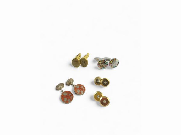 Quattro paia di gemelli in metallo e smalti  - Asta Vintagemania - Associazione Nazionale - Case d'Asta italiane