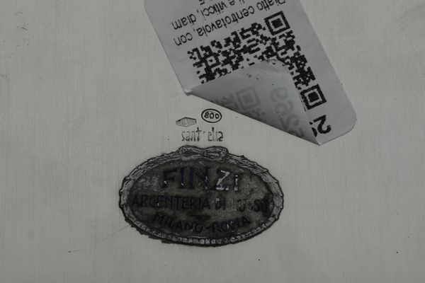 Centrotavola. Argenteria artistica milanese. Argentiere Arrigo Finzi. Marchio con fascio littorio in uso dal 1935 al 1945. Marchio incusso SANT'ELIA  - Asta Argenti da Collezione | Antichi - Associazione Nazionale - Case d'Asta italiane