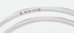 Coppia di candelabri. Bottega San Lorenzo, designer Antonio Piva, Milano 1970 ca  - Asta Argenti da Collezione | Antichi - Associazione Nazionale - Case d'Asta italiane