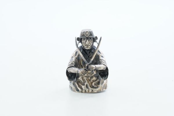 Accendino da tavolo a foggia di samurai. Argentiere Fratelli Lisi Firenze per Mario Buccellati. Italia XX secolo  - Asta Argenti da Collezione | XX secolo - Associazione Nazionale - Case d'Asta italiane