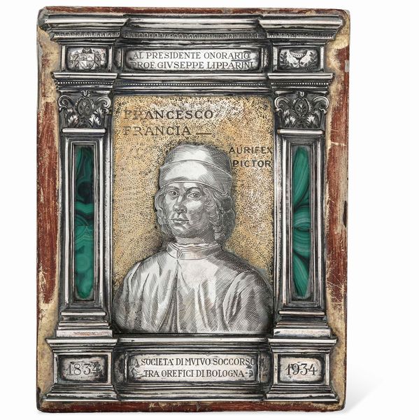Targa commemorativa. Argento fuso, sbalzato e cesellato. Malachite su tavola in legno dorata, argentiere Stefani Bologna, secondo quarto del XX secolo  - Asta Argenti da Collezione | XX secolo - Associazione Nazionale - Case d'Asta italiane