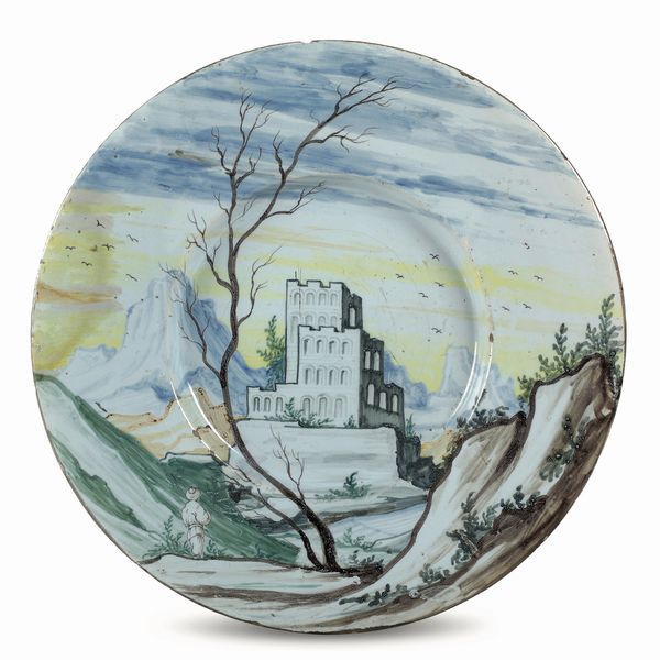 Grande piatto.<BR>Pavia, fine XVII - inizio XVIII secolo.<BR>  - Asta Maioliche, Porcellane e Figure Venete di un Collezionista Veneziano - Associazione Nazionale - Case d'Asta italiane