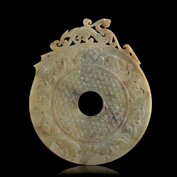 DISCO BI DI STILE ARCAICO IN GIADA  - Asta Arte asiatica e tribale  - Associazione Nazionale - Case d'Asta italiane