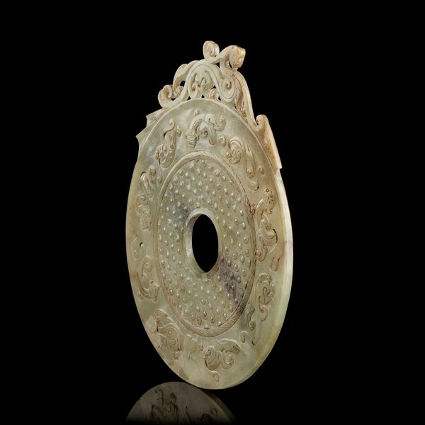 DISCO BI DI STILE ARCAICO IN GIADA  - Asta Arte asiatica e tribale  - Associazione Nazionale - Case d'Asta italiane