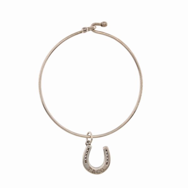 Tiffany & Co. bracciale in argento con pendente  a ferro di cavallo  - Asta Gioielli Orologi Fashion Vintage - Web Only - Associazione Nazionale - Case d'Asta italiane