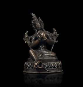 Figura di Avalokitesvara seduta su fiore di loto in bronzo, Tibet/Nepal, XVI secolo  - Asta The Art of Himalayan and Chinese Bronze - Associazione Nazionale - Case d'Asta italiane