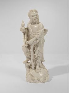 Arte Cinese - Figura in porcellana cinese bianca De hua raffigurante immortale su tartaruga. Cina, XX sec.