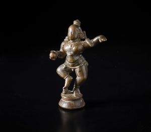Arte Indiana - Bronzo raffigurante Balakrishna danzante con una palla di burro nella mano.India del Sud,  XVIII-XIX sec.