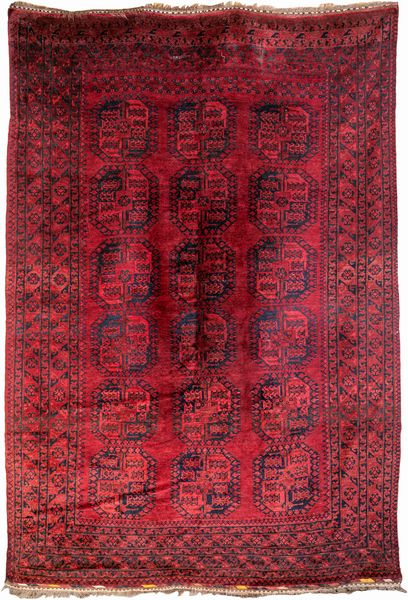 Grande tappeto afgano bicolore fondo rosso rubino  - Asta Asta a Tempo - Tappeti Antichi e Rari - Associazione Nazionale - Case d'Asta italiane