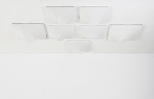 CHIGGIO ENNIO (1938 - 2020) - Sette lampade da parete per Emmezeta, Padova