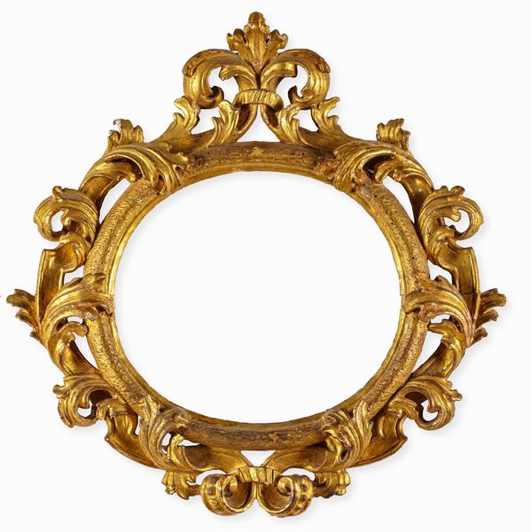 Cornice ovale in legno intagliato e dorato. Emilia XVIII secolo  - Asta Cornici Antiche - Associazione Nazionale - Case d'Asta italiane