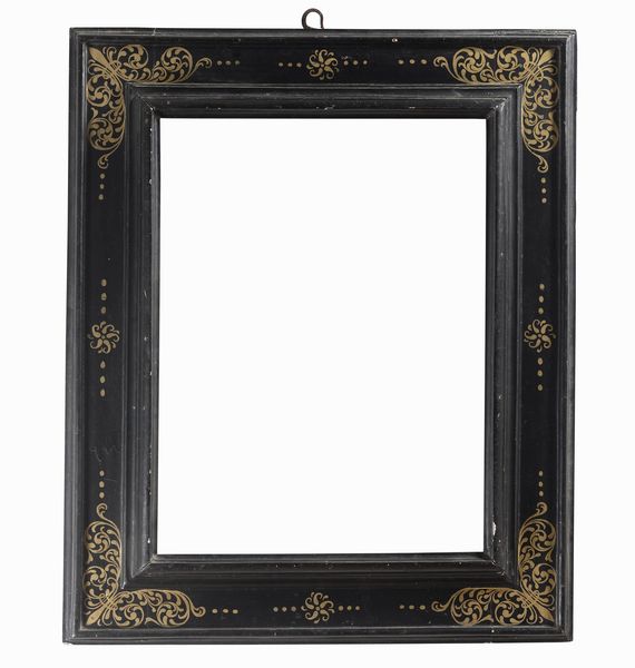 Cornice a cassetta in legno ebanizzato con racemi dorati. Toscana XVII secolo  - Asta Cornici Antiche - Associazione Nazionale - Case d'Asta italiane