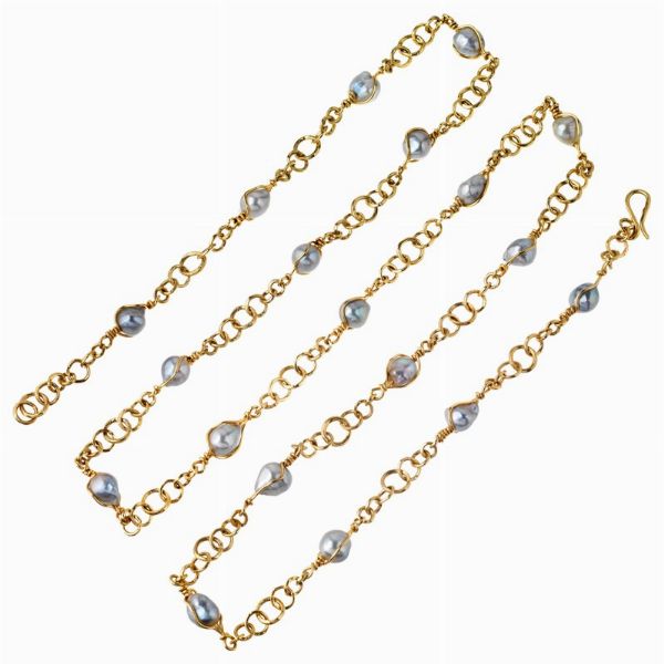 LUNGA COLLANA A CATENA CON PERLE BAROCCHE  - Asta GIOIELLI - Associazione Nazionale - Case d'Asta italiane