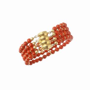BRACCIALE SEMIRIGIDO E SPILLA/PENDENTE CON CORALLO  - Asta GIOIELLI - Associazione Nazionale - Case d'Asta italiane