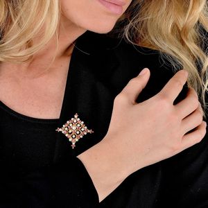 SPILLA CON PERLE E RUBINI  - Asta GIOIELLI - Associazione Nazionale - Case d'Asta italiane
