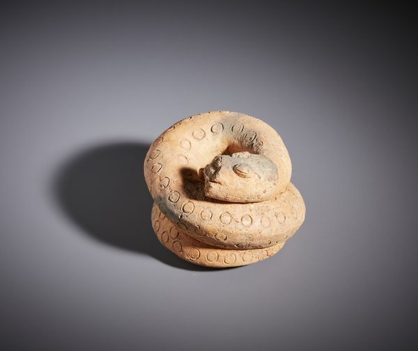 Bambara - Mali : Piccola scultura zoomorfa a forma di serpente acciambellato in terracotta  - Asta Asta 444 | AFRICA, OCEANIA E AMERICHE - ARTIGIANATO AFRICANO: VARI COMMITTENTI E SELEZIONE DALLA COLLEZIONE BARTOLOMUCCI Online - Associazione Nazionale - Case d'Asta italiane