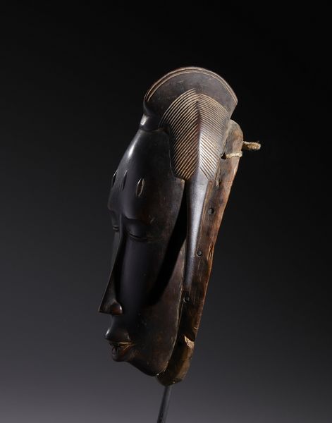 Guro - Costa d'Avorio : Nello stile di Maschera antropomorfa  in legno duro a patina scura  - Asta Asta 444 | AFRICA, OCEANIA E AMERICHE - ARTIGIANATO AFRICANO: VARI COMMITTENTI E SELEZIONE DALLA COLLEZIONE BARTOLOMUCCI Online - Associazione Nazionale - Case d'Asta italiane