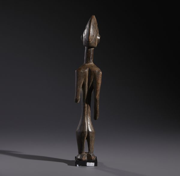 Bambara - Mali : Nello stile diScultura antropomorfa in  legno duro a patina scura difetti ed una mancanza  - Asta Asta 444 | AFRICA, OCEANIA E AMERICHE - ARTIGIANATO AFRICANO: VARI COMMITTENTI E SELEZIONE DALLA COLLEZIONE BARTOLOMUCCI Online - Associazione Nazionale - Case d'Asta italiane