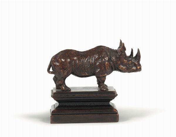 Rinoceronte in legno tinto su base in legno ebanizzato. Germania XVIII secolo  - Asta Scultura e Oggetti d'Arte - Associazione Nazionale - Case d'Asta italiane