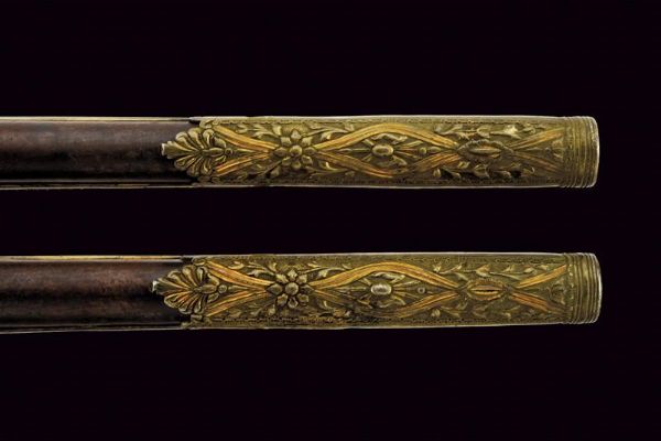 Bella coppia di pistole a pietra focaia con fornimenti intagliati  - Asta Rare Armi Antiche e Armature da Tutto il Mondo - Associazione Nazionale - Case d'Asta italiane