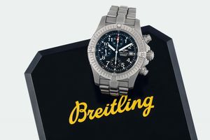 Breitling - Breitling, Chronograph - Chronometer - Automatic, Ref. E 13360. Orologio da polso, in titanio, automatico, impermeabile, con datario e bracciale originale con chiusura deployante. Accompagnato dalla scatola originale, Garanzia, libretti, Certificato di Cronometria. Venduto nel 2001