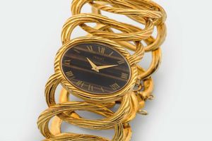 Piaget - PIAGET, TIGER'S EYE DIAL, raro e raffinato, orologio da polso, in oro giallo 18K con bracciale integrato in oro. Realizzato nel 1970 circa