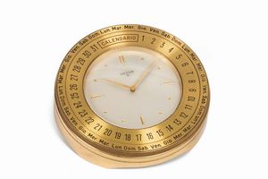 LUXOR - LUXOR. Orologio da tavolo, in ottone dorato con calendario e riserva di carica di 8 giorni. Realizzato nel 1960 circa