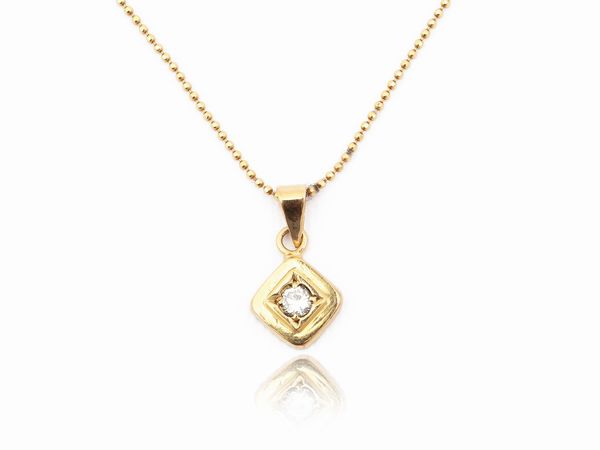 Catenina e pendente punto luce in oro giallo con diamante  - Asta Gioielli e Orologi - Associazione Nazionale - Case d'Asta italiane