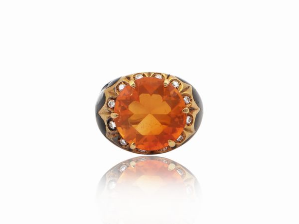 Anello in oro giallo con diamanti, smalti neri e gemma arancio  - Asta Gioielli e Orologi - Associazione Nazionale - Case d'Asta italiane
