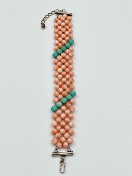 Bracciale a maglia tessita con corallo rosa, turchese ed argento  - Asta Gioielli e Argenti Moderni e Contemporanei - Associazione Nazionale - Case d'Asta italiane