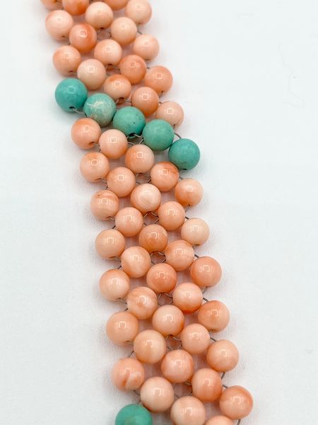 Bracciale a maglia tessita con corallo rosa, turchese ed argento  - Asta Gioielli e Argenti Moderni e Contemporanei - Associazione Nazionale - Case d'Asta italiane