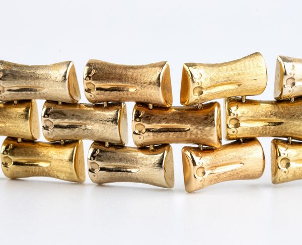 Bracciale in oro con motivo a bamb  - Asta Gioielli e Argenti Moderni e Contemporanei - Associazione Nazionale - Case d'Asta italiane
