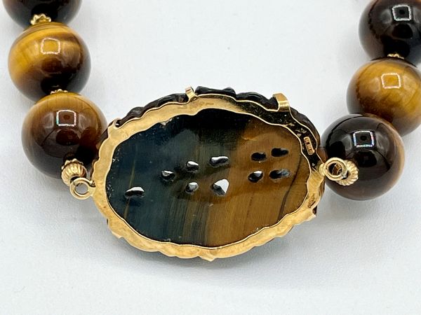 Girocollo in oro e quarzo occhio di tigre  - Asta Gioielli e Argenti Moderni e Contemporanei - Associazione Nazionale - Case d'Asta italiane