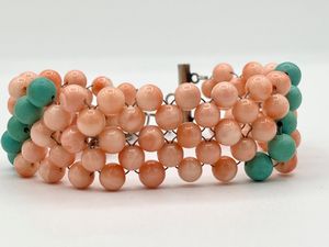 Bracciale a maglia tessita con corallo rosa, turchese ed argento  - Asta Gioielli e Argenti Moderni e Contemporanei - Associazione Nazionale - Case d'Asta italiane