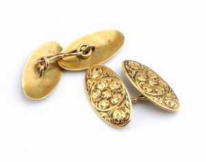 Un fermacravatta ed un paio di gemelli in oro  - Asta Gioielli e Argenti Moderni e Contemporanei - Associazione Nazionale - Case d'Asta italiane