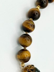 Girocollo in oro e quarzo occhio di tigre  - Asta Gioielli e Argenti Moderni e Contemporanei - Associazione Nazionale - Case d'Asta italiane