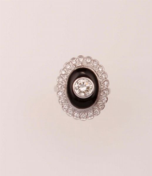 Anello con diamante taglio brillante di ct 0,95 ed onice  - Asta Fine Jewels - Associazione Nazionale - Case d'Asta italiane