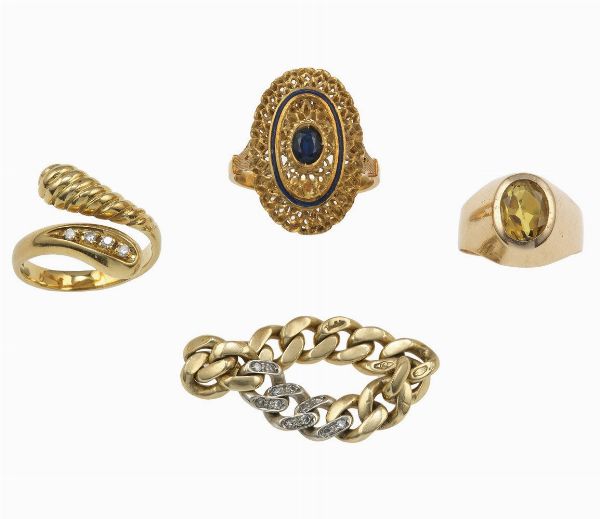 Lotto composto da quattro anelli di cui uno firmato Morellato  - Asta Gioielli - Associazione Nazionale - Case d'Asta italiane