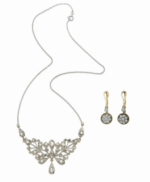 Lotto composto da una collana ed un paio di orecchini con rosette di diamanti e piccoli diamanti  - Asta Gioielli - Associazione Nazionale - Case d'Asta italiane
